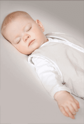 Baby peacefully sleeping in a Joey Swag Baby Sleeping Bag, safe and secure for a comfortable sleep.