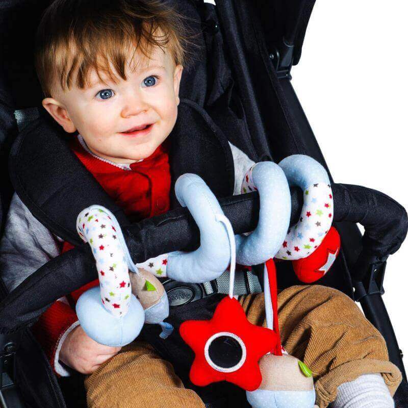 Spiraloo Bertie Bear Baby Activity Toy attached to a pram with a smiling baby, designed to stimulate senses.
